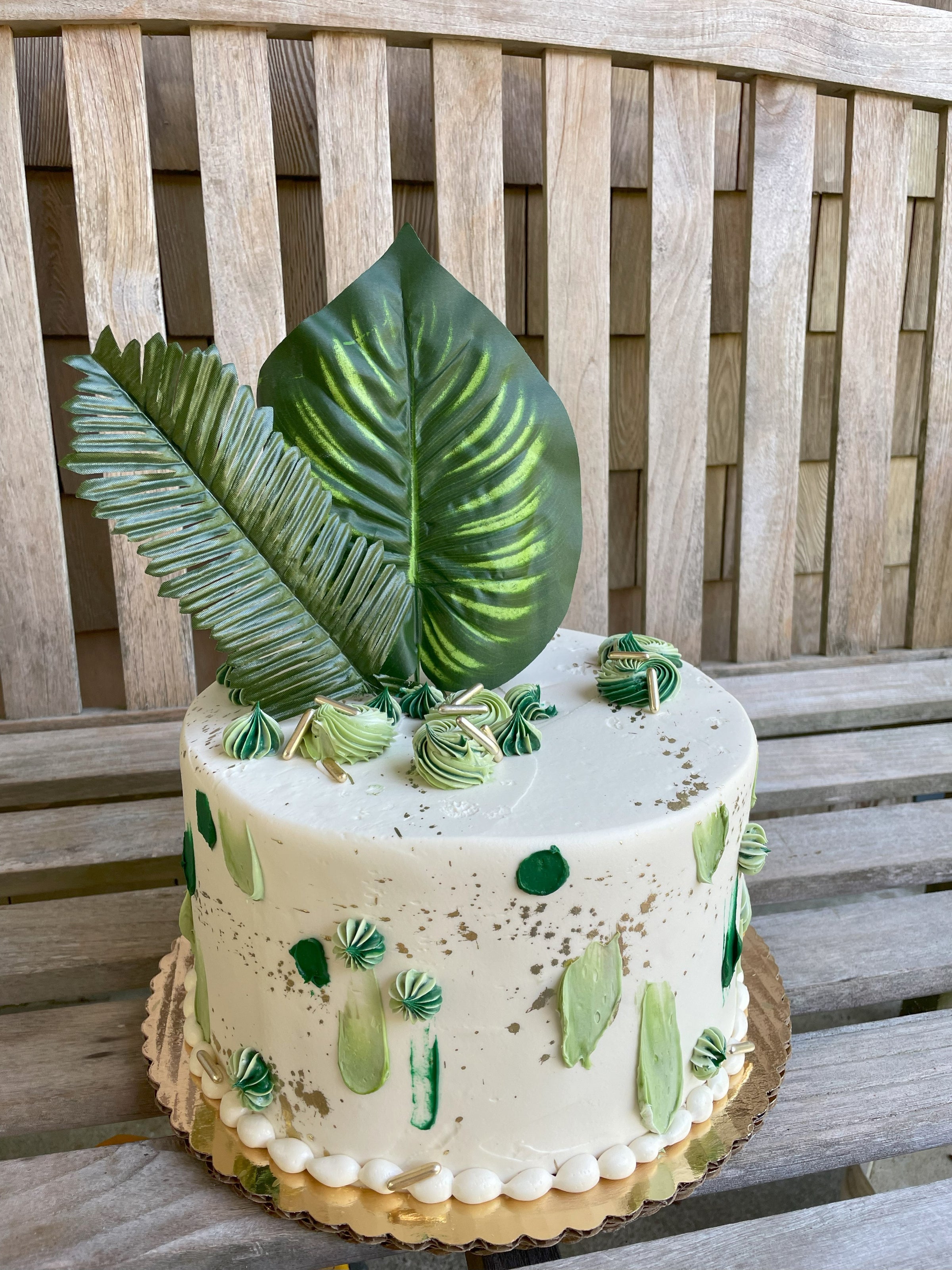green leaf dinosaur safari animal cake monstera leaves tropical